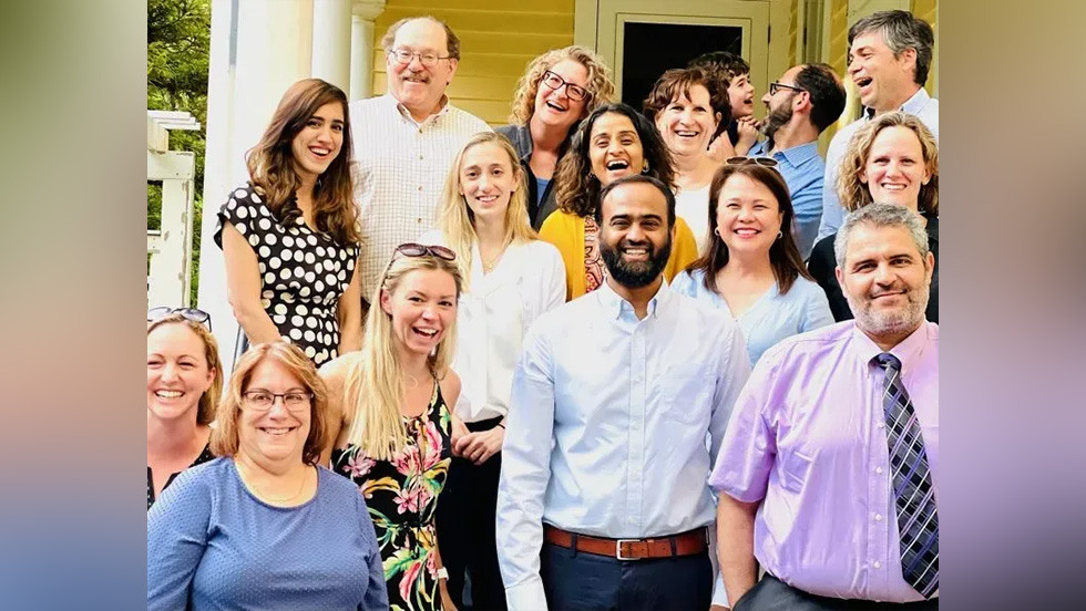 several people posing together for a photo