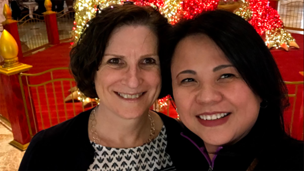 two people posing for a photo